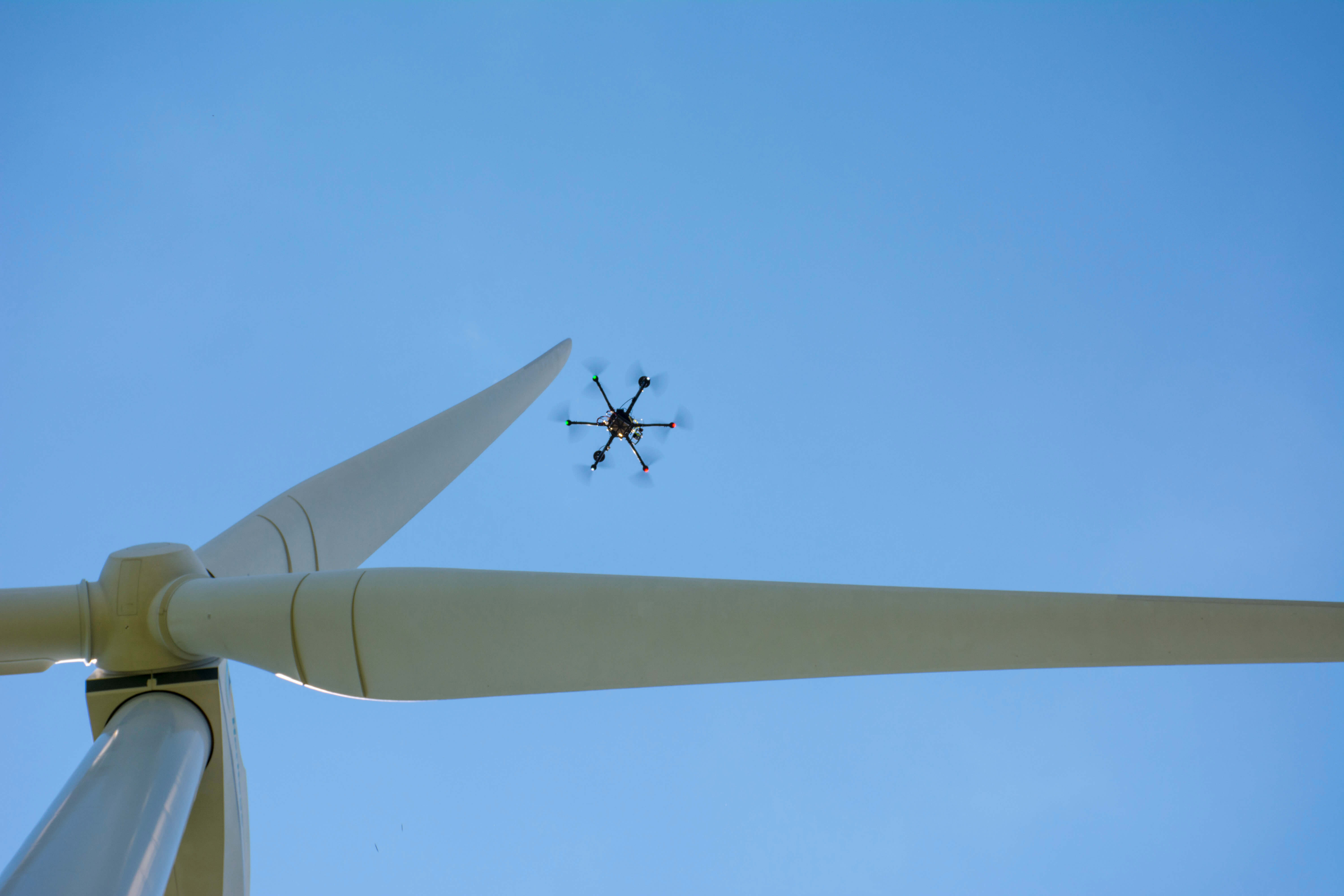 A SkySpecs’ drone automatically collects images and data during turbine blade inspections — and in less than 15 minutes. 